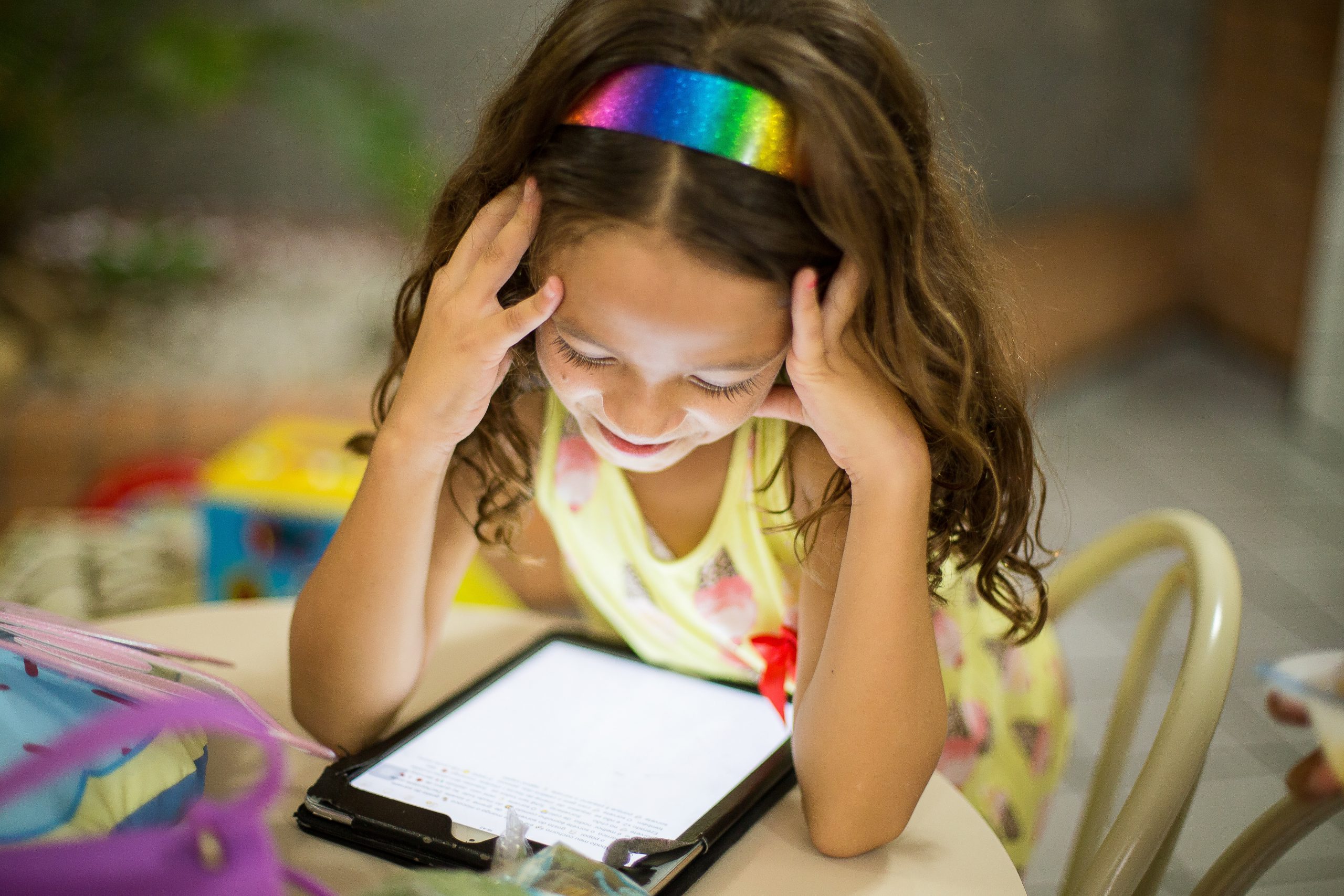 Young child looking at a tablet
